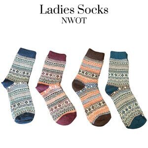 NWOT Ladies warm winter socks.  Four pairs in this bundle.  Size OS
